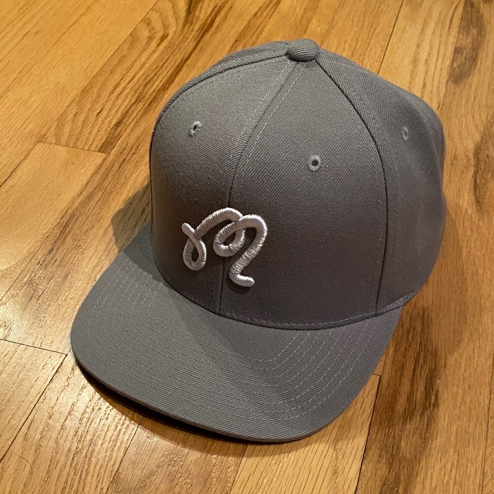 Malbon Grey Snapback hat.